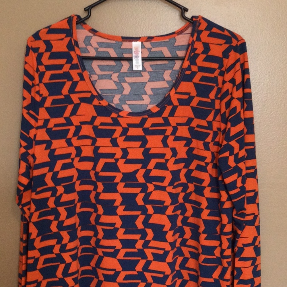 New with Tags Lularoe Lynnae Shirt, size XL. Navy and orange pattern